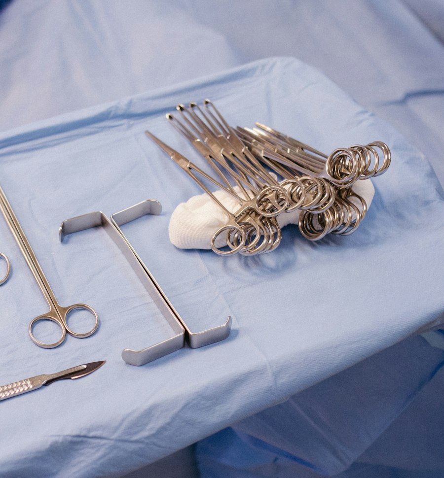 Sterile surgical instruments laid out on a blue drape